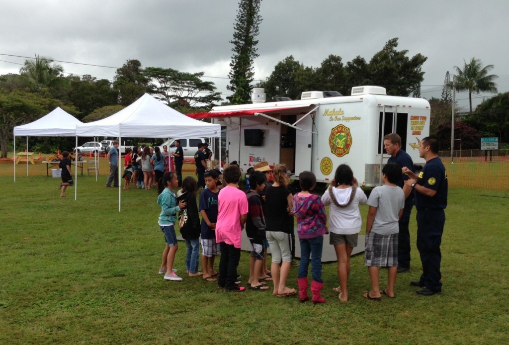 Kaua‘i firefighters use Sparky’s Fire Safety House, a trailer modeled after a home, so families can actively practice what to do in the event of a residential fire.