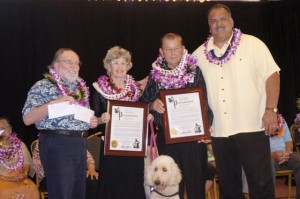 L-R): Governor Neil Abercrombie, Dr. Lucy Miller with Muffin; William Neil Rapozo, Sr.; and Mayor Carvalho.