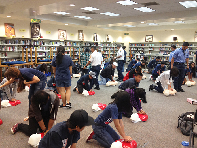 Hands Only CPR Training at Keaau High School Library (photo courtesy of Hawaii Fire Department)