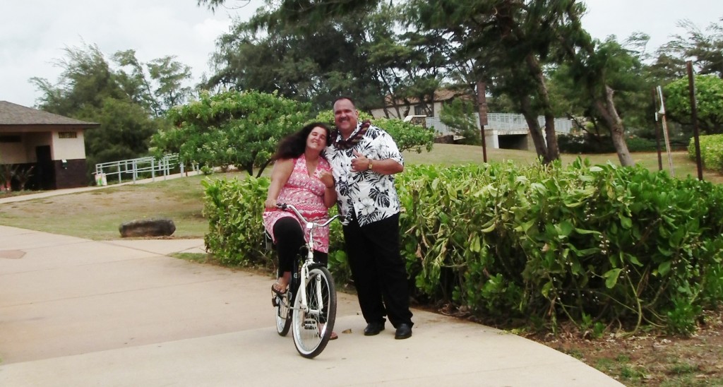 Kapa‘a resident Ann Punohu stops to talk story with Mayor Bernard Carvalho, Jr. during the celebration of the completion of 3 new segments of Ke Ala Hele Makalae, Kaua'i’s multi-use path. Seeking a healthier lifestyle, Punohu sold her truck about three months ago and bought a bicycle, and now uses the coastal path for most of her travels between Wailua and Keâlia.