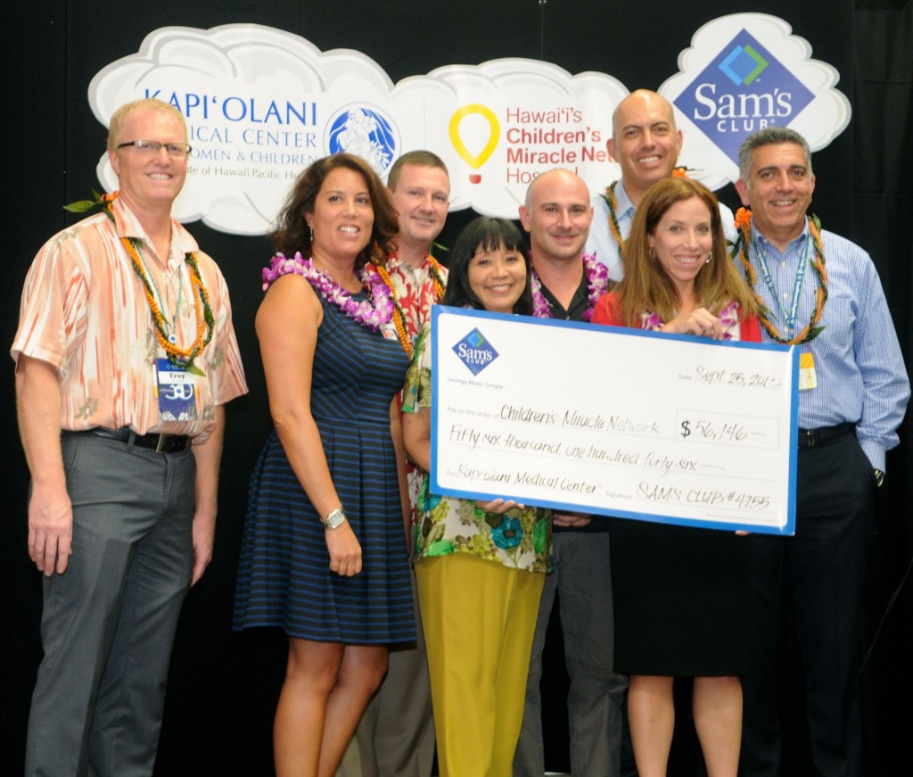 From Left to Right: Troy Yach, Honolulu Sam's Club Manager, Stacey Acma Director of Kapi'olani Children's Miracle Network, Todd Harbaugh, Executive Vice President of Operations for Sam's Club, Mavis Nikaido, Chief Nurse Executive for Kapi'olani Medical Center, Dr. Konstantine Xoinis, Co-Director Prenatal and Pediatrics Transport Team, Patrice Johnson, Director Corporate Partnerships for Children's Miracle Network Hospitals, Louie Santos, Hawaii Market Manager for Sam's Club and Sean Mehranbod, Vice President/Regional General Manager for Sam's Club.