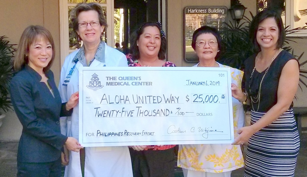 The Queen’s Medical Center presented a $25,000 check to Aloha United Way for its Philippines Disaster Recovery Fund. Pictured are (from left): Queen’s VP of Community Development Sharlene Tsuda, APRN Anne Leake, RN Leilani Marcella, volunteer Liberty Vencill, and Kim Gennaula.    