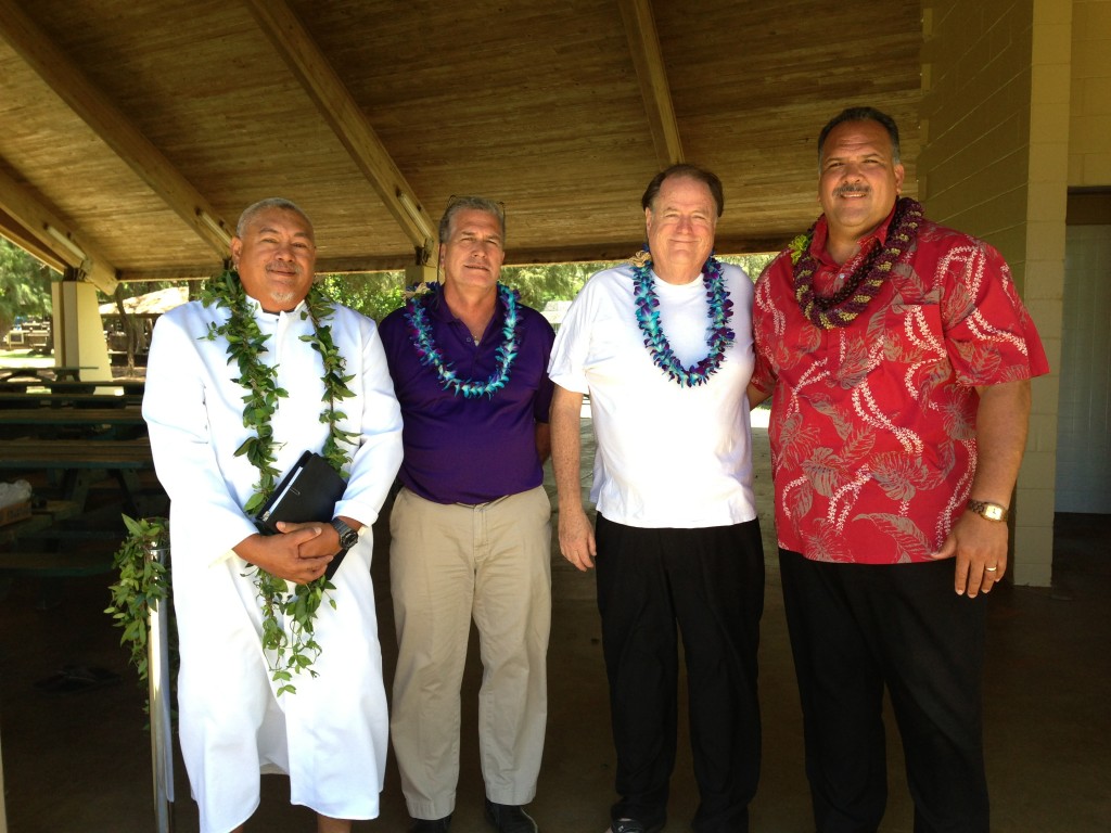 Kahu Poki Battad, Parks and Recreation Deputy Director Ian Costa, Councilman Tim Bynum and Mayor Bernard Carvalho, Jr. pose for a photo at the blessing that marked the completion of the Lydgate Park improvements project. 