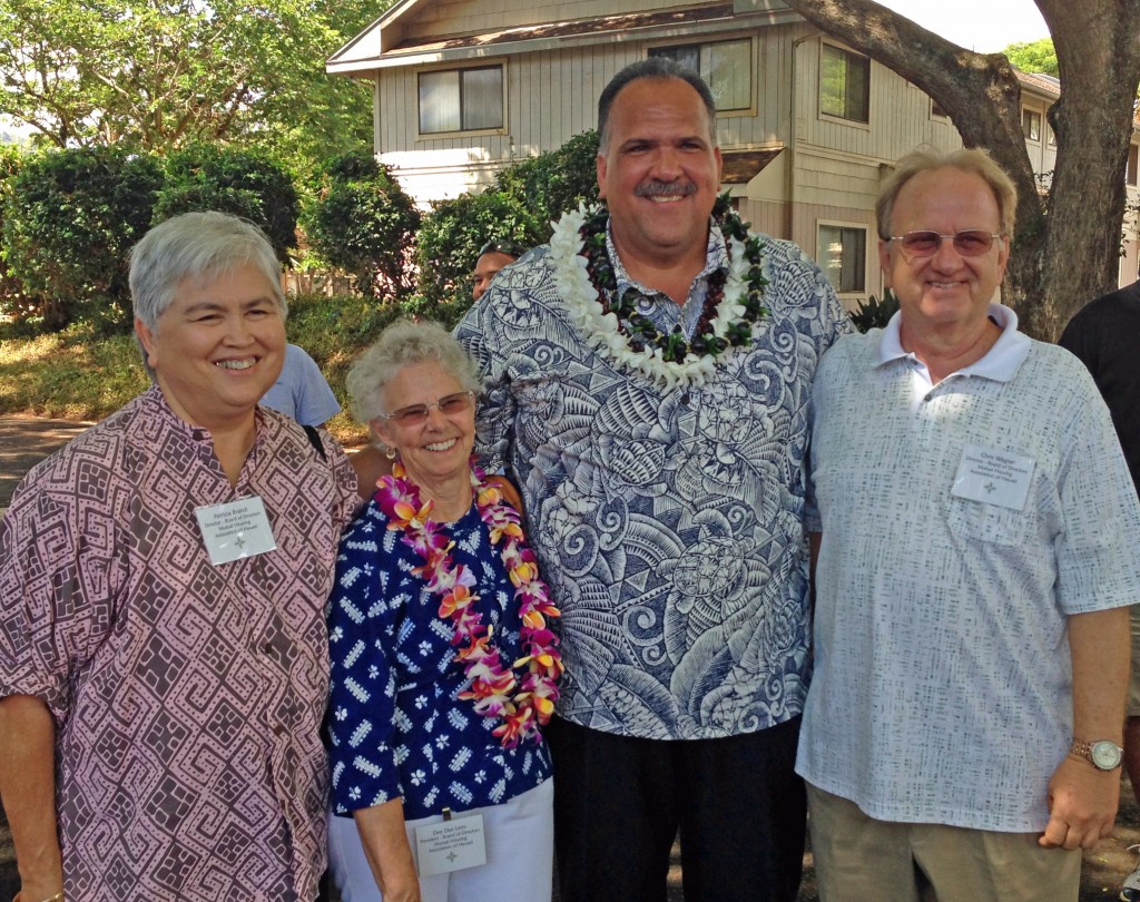 L to R: Patricia Brandt, board member; Dee Dee Letts, board president; Mayor Carvalho and Chris Wagner, board member. MHAH is the owner and manager of the housing complex.