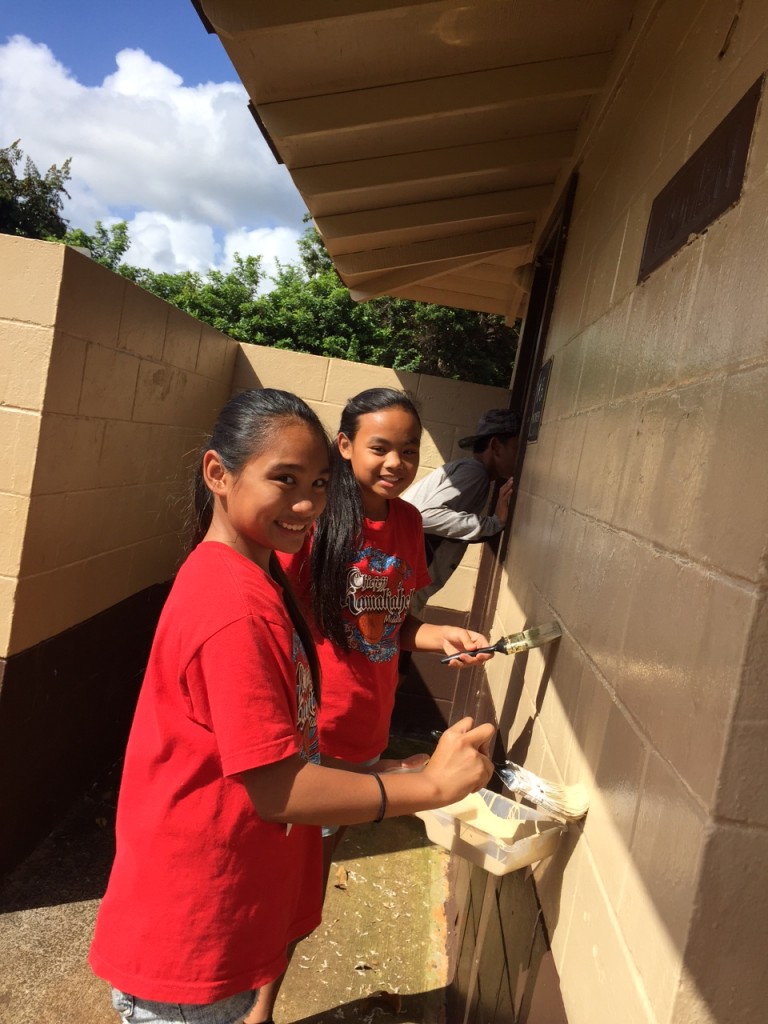  Jessica and Amalya. Approximately 20 members of the Boys and Girls of Hawai‘i and BGCH Youth Development Specialist Grace Peralta painted over graffiti Wednesday at the Puhi Regional Park. The mission of the BGCH is to inspire young people to become responsible citizens.